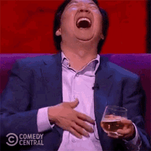 ken-jeong-laughing-hysterically-lyvns9cr5uyyvqic.gif